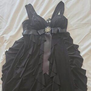 Beautiful black dress with nice touch of sparkle in the middle!